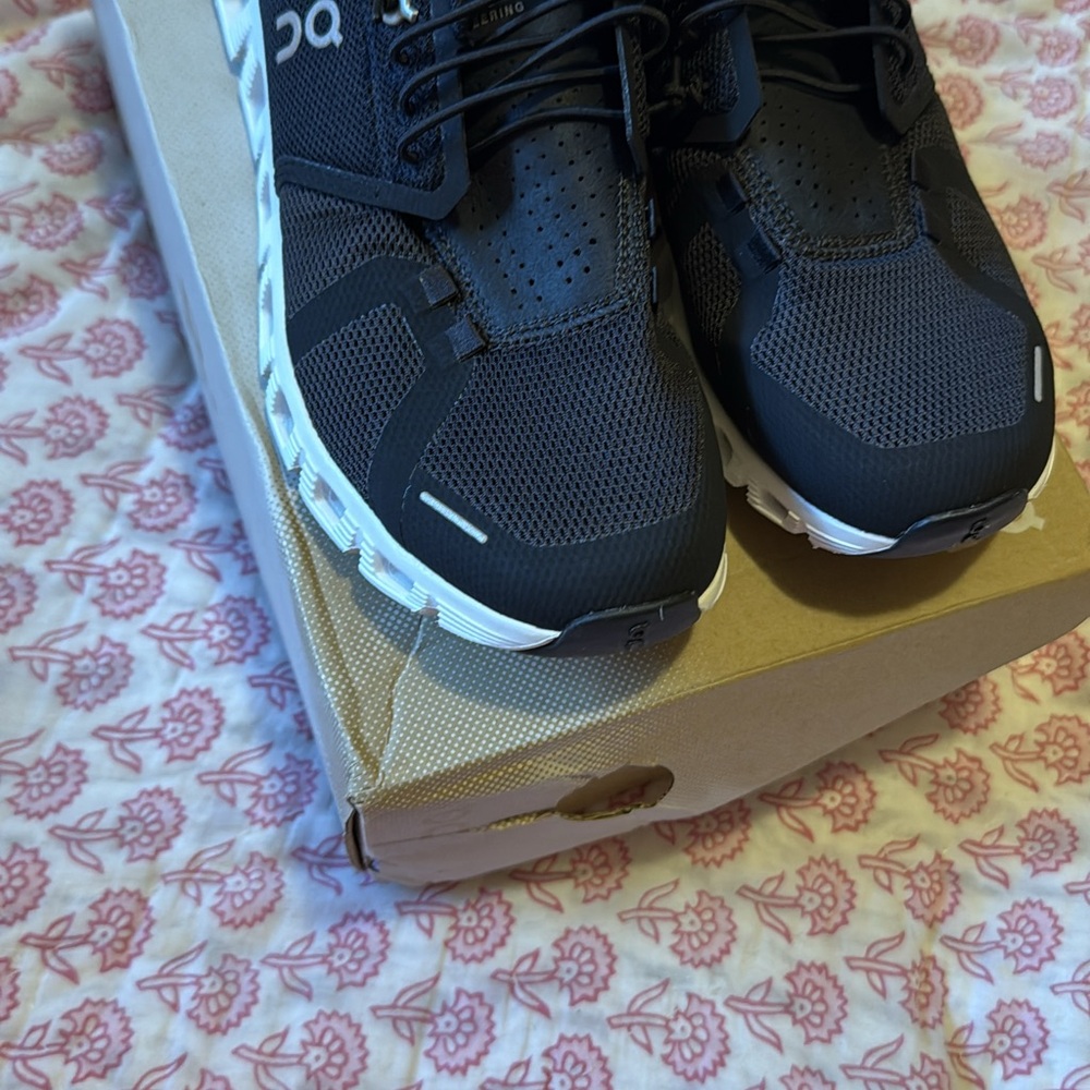 On Running Black and White Athletic Shoes